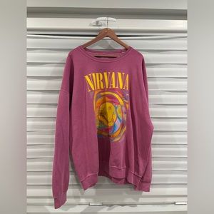 A pink Nirvana band oversize crewneck sweater